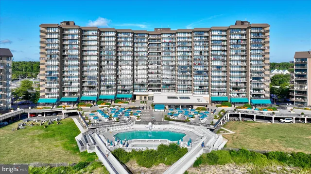 a view of a cars parked in front of a house