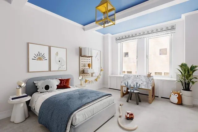 a bedroom with bed and a window