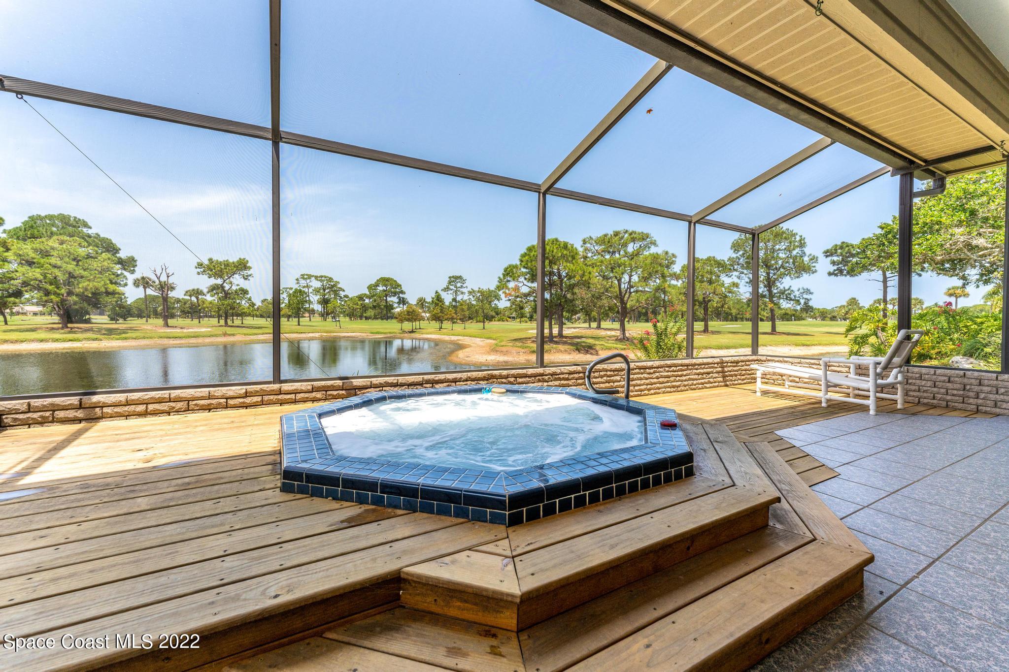 750 Kerry Downs Circle Melbourne, FL 32940 - Photo 22 of 34 a view of swimming pool with seating area