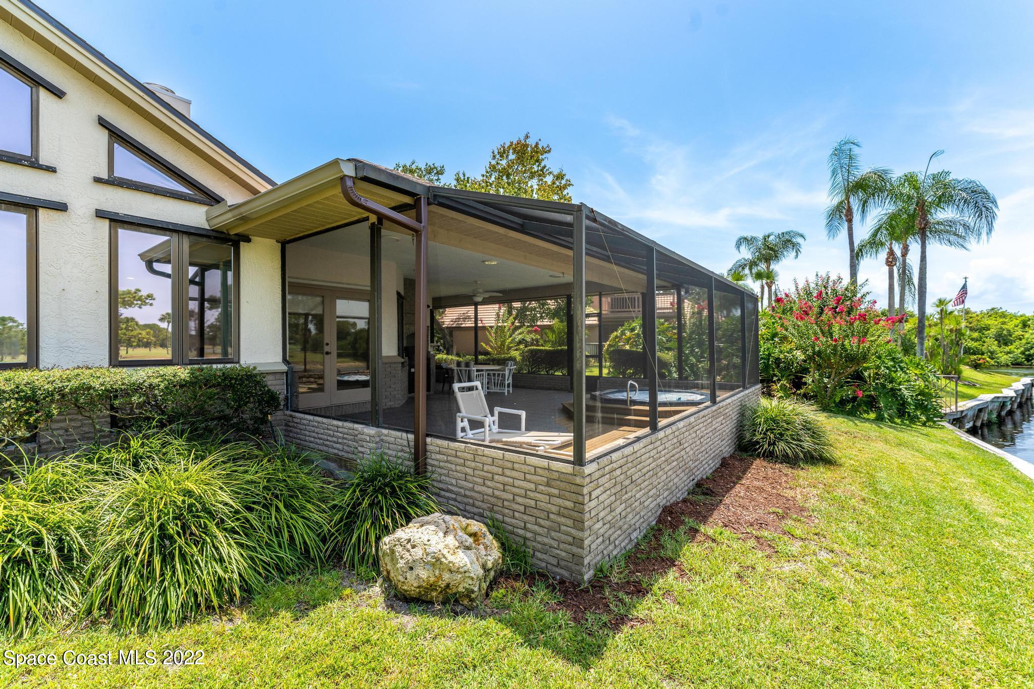 750 Kerry Downs Circle Melbourne, FL 32940 - Photo 23 of 34 a view of a house with backyard and sitting area