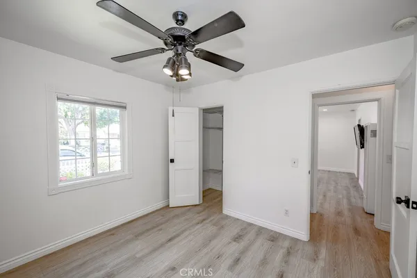 a kitchen with stainless steel appliances granite countertop a stove and a refrigerator
