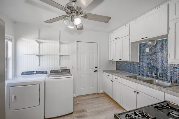a view of a livingroom with wooden floor