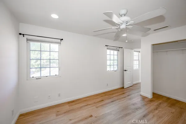 a kitchen with stainless steel appliances stove top oven and cabinets