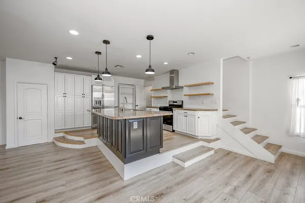 a view of a swimming pool with a sitting area