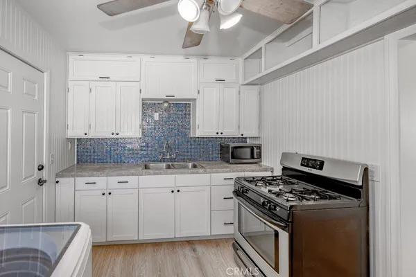 a view of a bathroom from a hallway