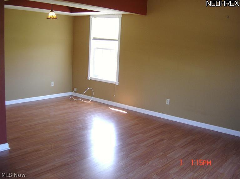 Formal dining area or additional living room space.