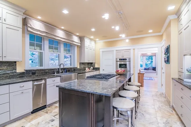 a kitchen with granite countertop lots of counter top space