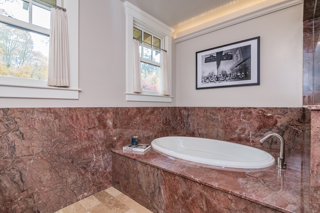 9 Harkness Road Pelham, MA 01002 - Photo 20 of 42 a bathroom with a sink and a mirror