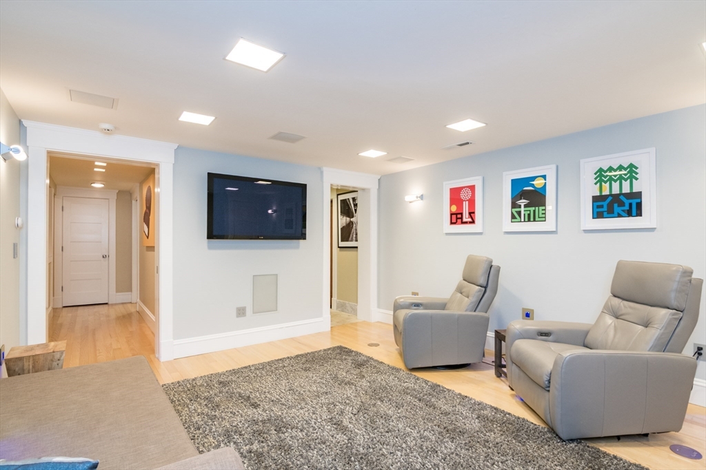 9 Harkness Road Pelham, MA 01002 - Photo 30 of 42 a living room with furniture and a flat screen tv