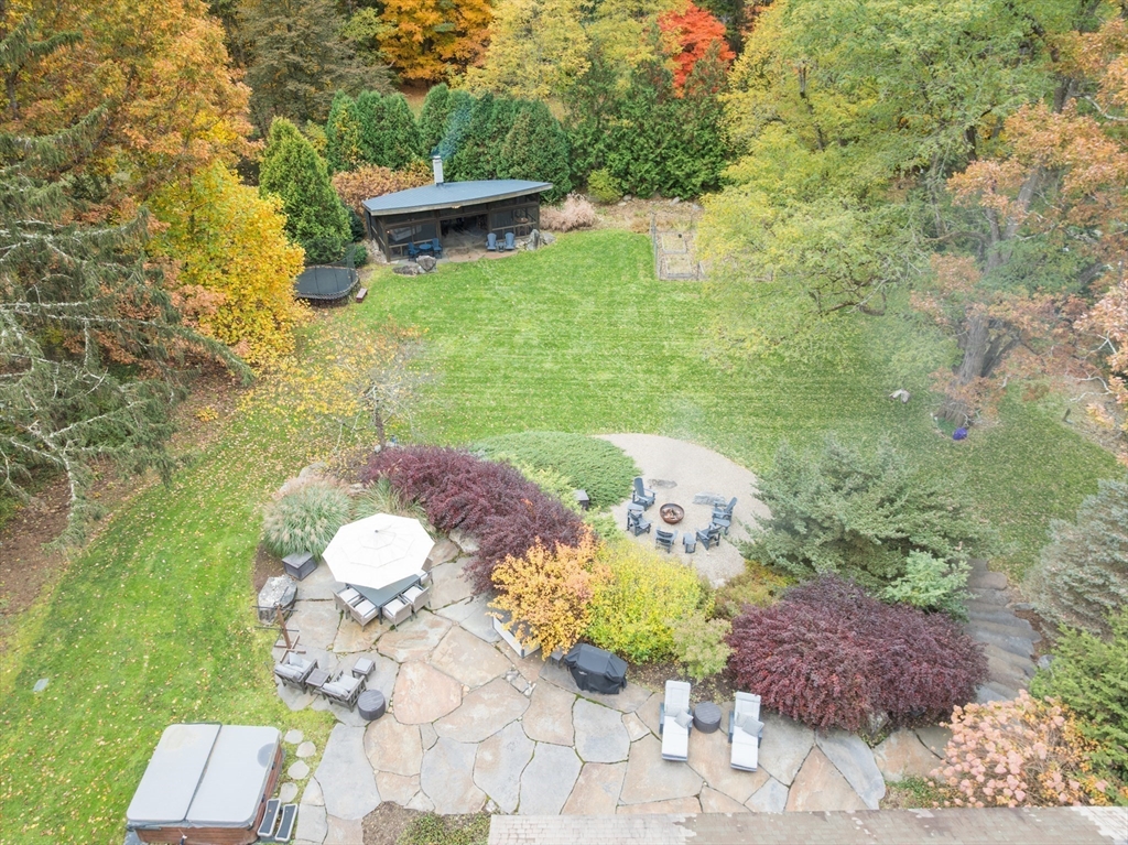 9 Harkness Road Pelham, MA 01002 - Photo 40 of 42 a view of a backyard with plants and large trees