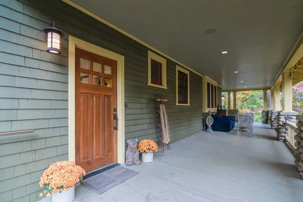 a outdoor space with patio furniture and potted plants