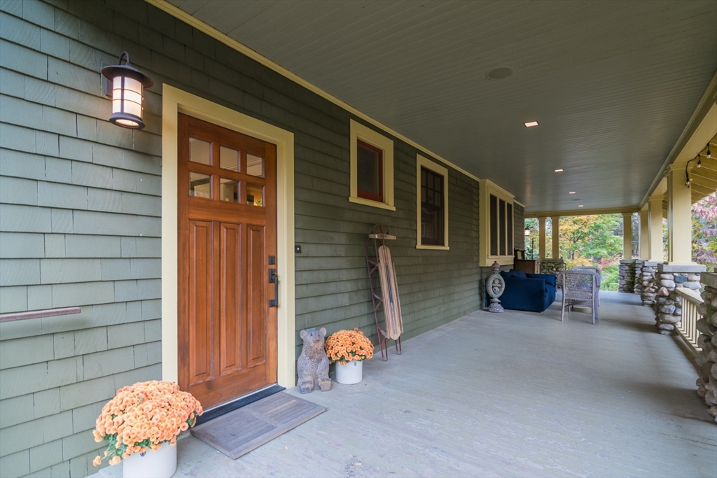 9 Harkness Road Pelham, MA 01002 - Photo 5 of 42 a outdoor space with patio furniture and potted plants