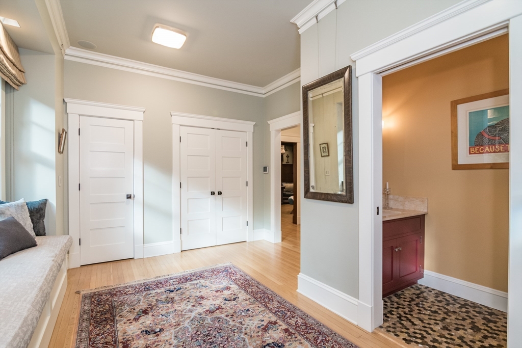 9 Harkness Road Pelham, MA 01002 - Photo 7 of 42 a view of a bedroom with wooden floor and cabinet