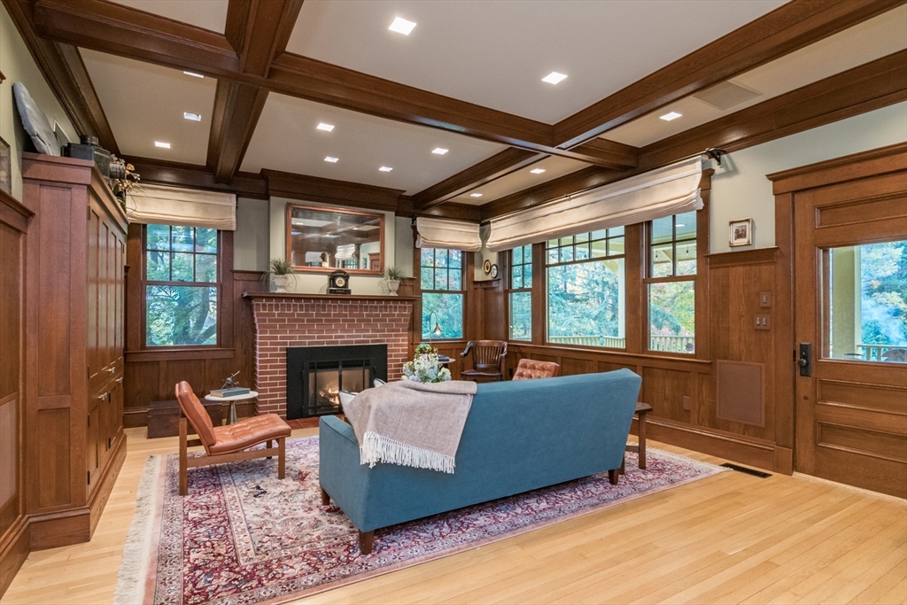 9 Harkness Road Pelham, MA 01002 - Photo 9 of 42 a living room with furniture and a fireplace