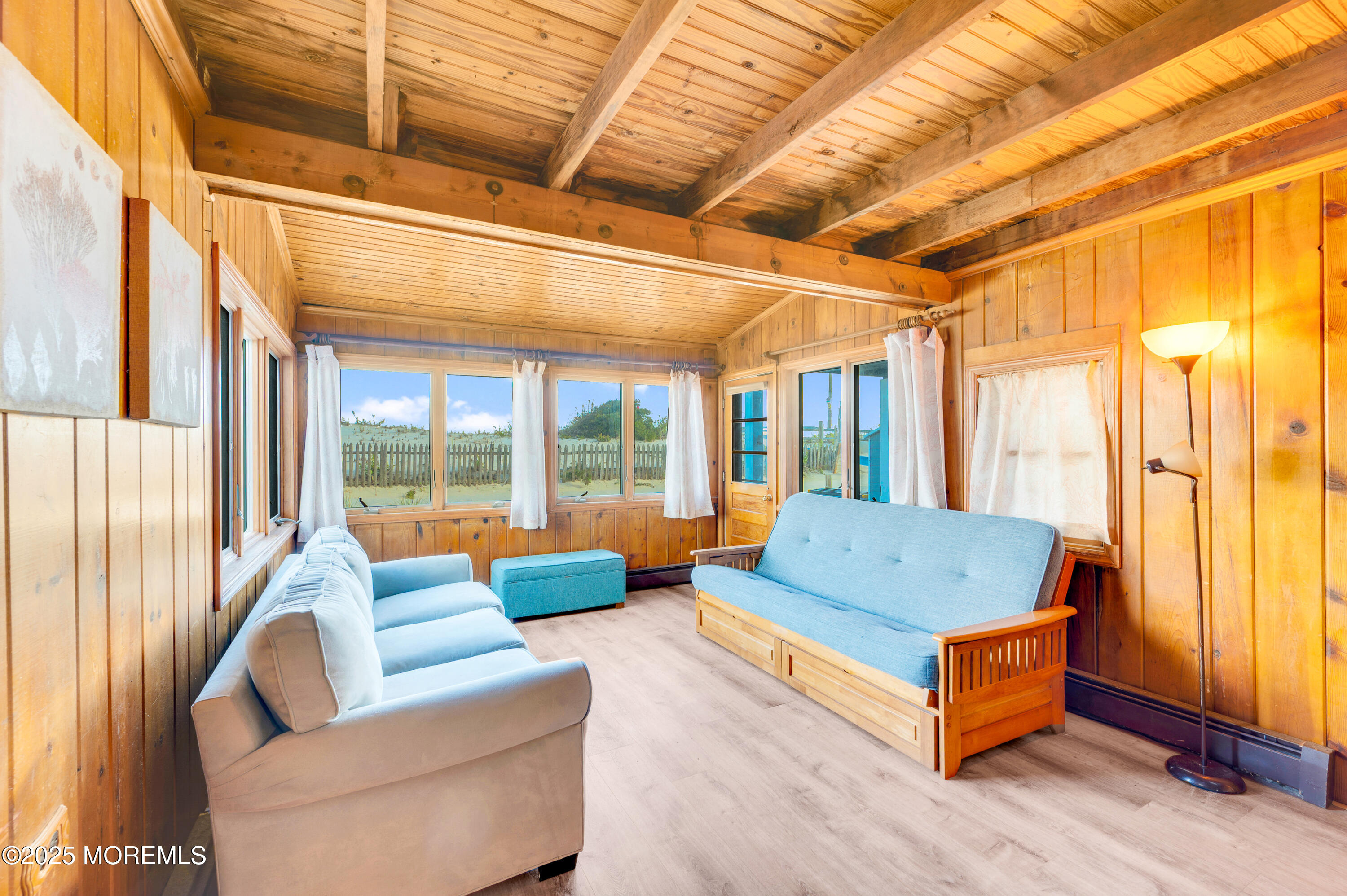63 East Rutherford Lane Lavallette, NJ 08735 - Photo 14 of 33 a living room with furniture and a large window