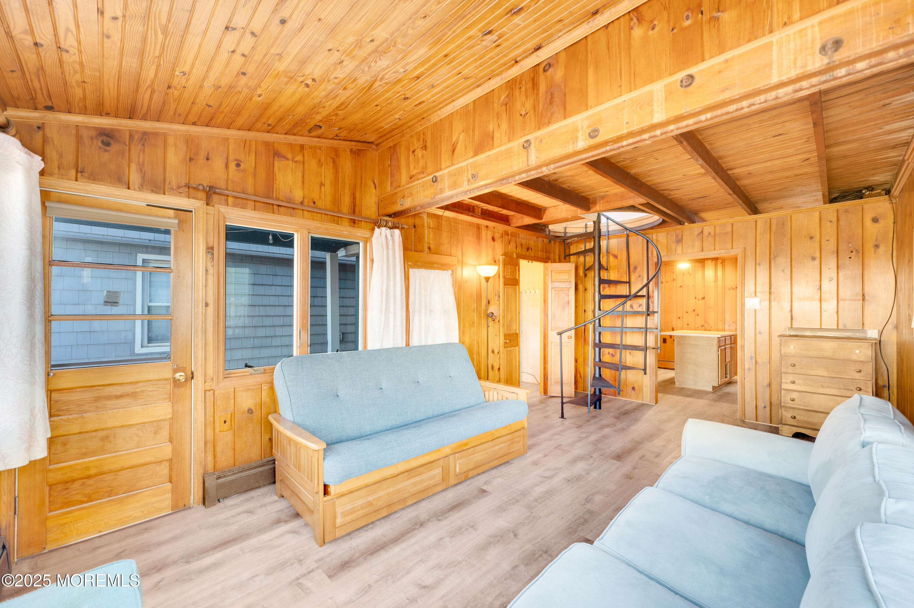 63 East Rutherford Lane Lavallette, NJ 08735 - Photo 15 of 33 a living room with furniture and a flat screen tv
