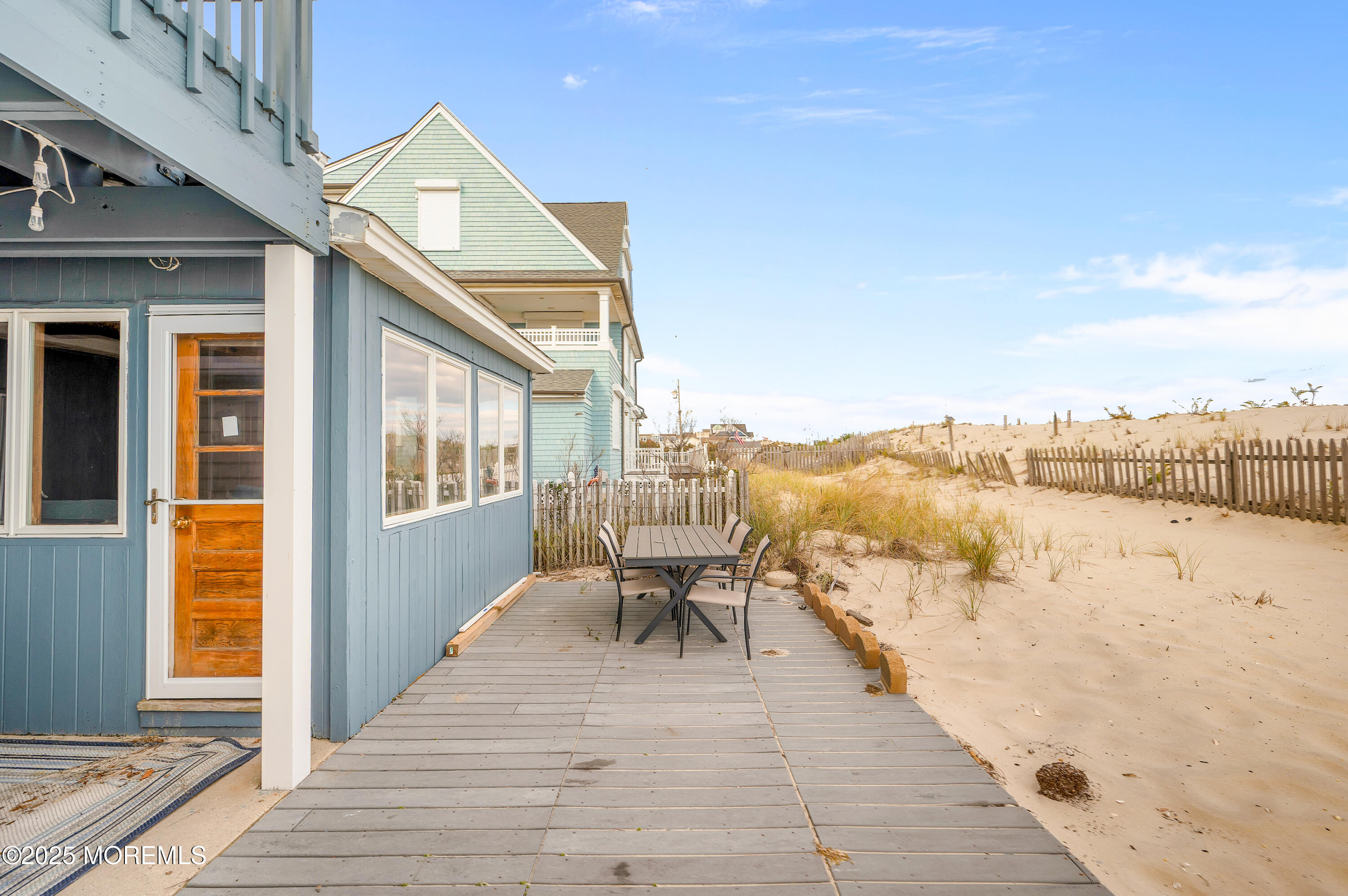 63 East Rutherford Lane Lavallette, NJ 08735 - Photo 25 of 33 a view of roof deck with patio