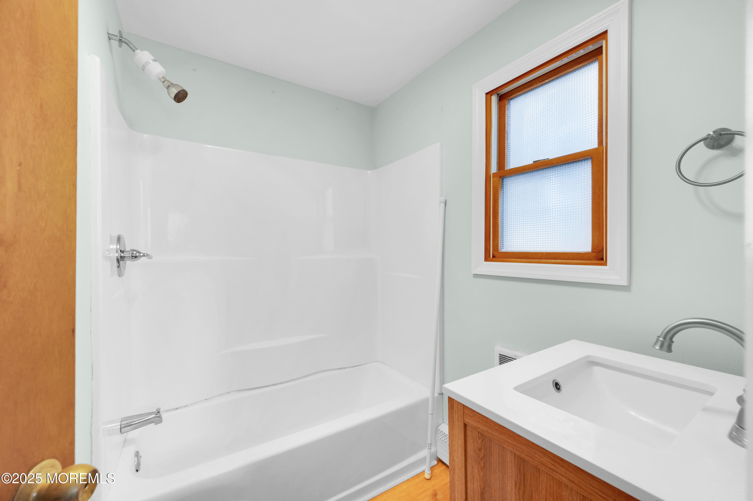 63 East Rutherford Lane Lavallette, NJ 08735 - Photo 27 of 33 a bathroom with a bathtub and a sink