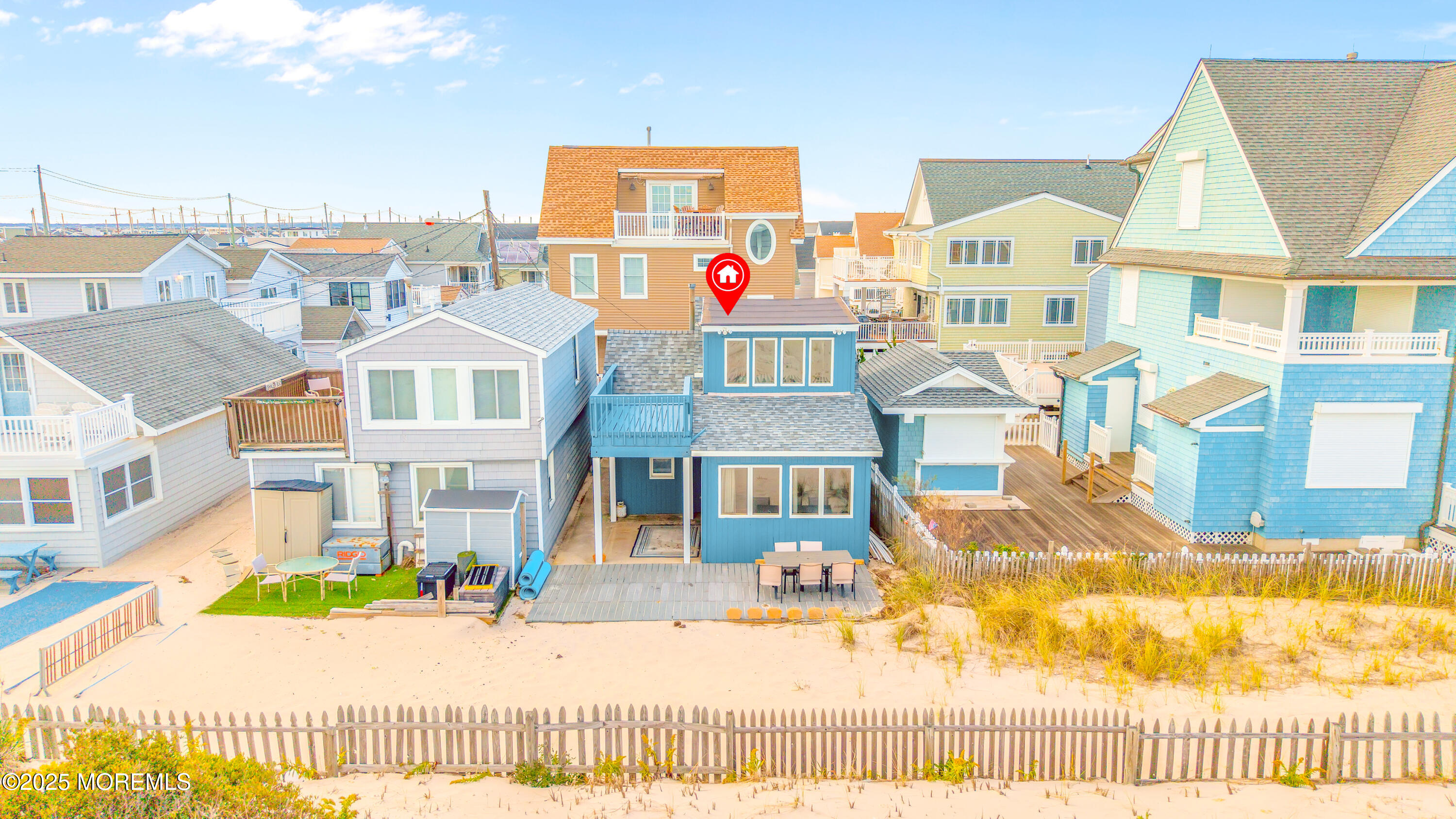 63 East Rutherford Lane Lavallette, NJ 08735 - Photo 3 of 33 a view of a city with tall buildings