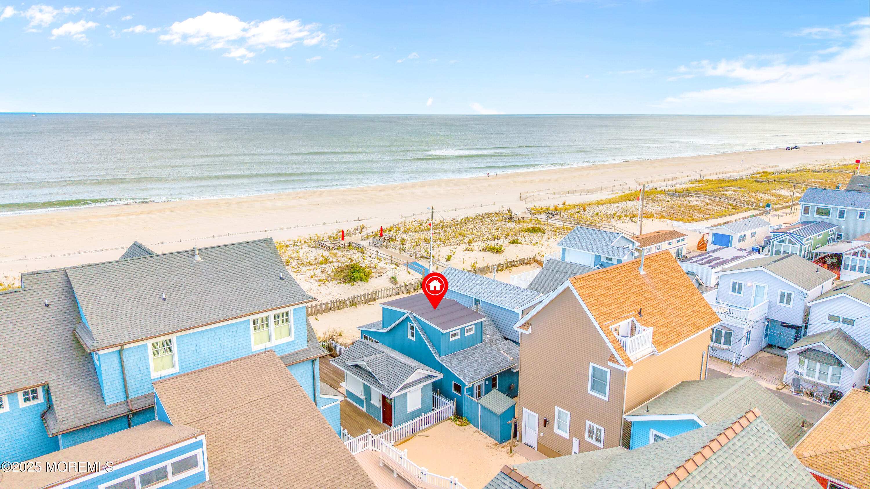 63 East Rutherford Lane Lavallette, NJ 08735 - Photo 5 of 33 an aerial view of residential houses with an outdoor space and seating