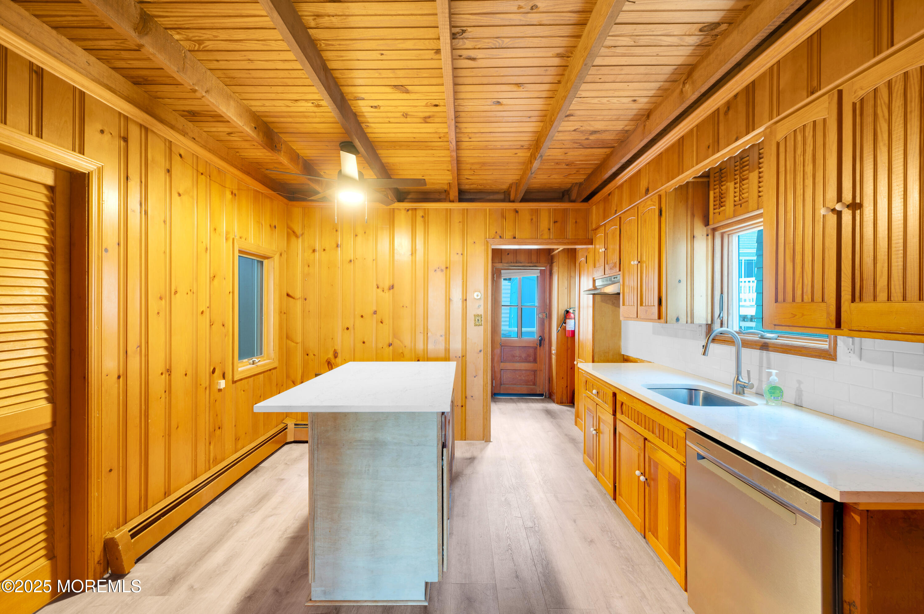 63 East Rutherford Lane Lavallette, NJ 08735 - Photo 9 of 33 a bathroom with a sink a mirror and a shower