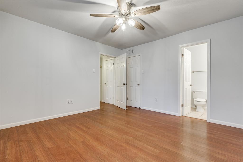 5626 Preston Oaks Road, Unit 42B Dallas, TX 75254 - Photo 19 of 25 wooden floor in an empty room