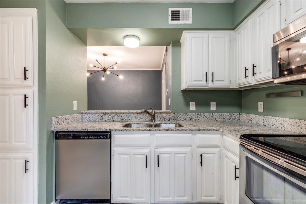5626 Preston Oaks Road, Unit 42B Dallas, TX 75254 - Photo 10 of 25 a bathroom with a sink and a mirror