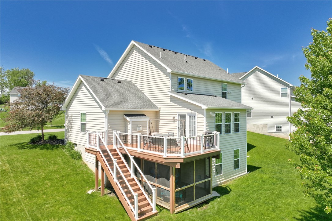 32 Ashlyn Rise Penfield, NY 14450 - Photo 6 of 50 View of the 2nd story deck and screened in porch w