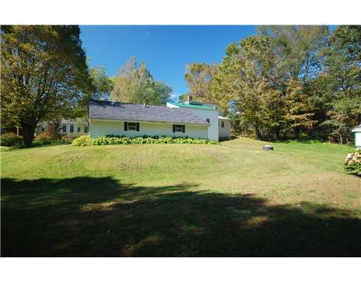 376 Intervale Road New Gloucester, ME 04260 - Photo 5 of 25 Exterior Back. Well-Lanscaped Lawn...