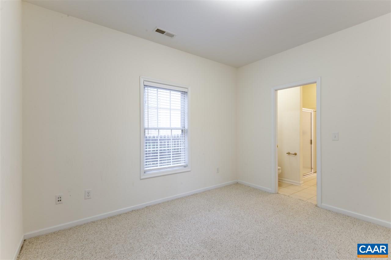 907 Raymond Road Charlottesville, VA 22902 - Photo 14 of 34 an empty room with windows
