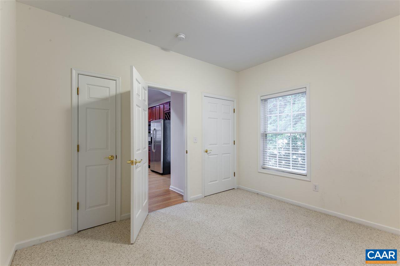 907 Raymond Road Charlottesville, VA 22902 - Photo 15 of 34 an empty room with windows and closet