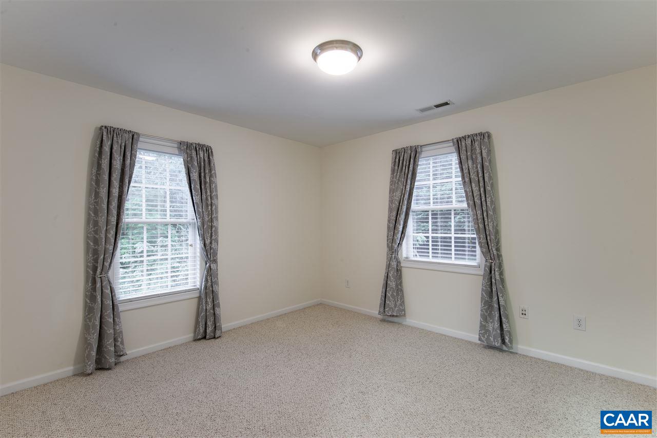 907 Raymond Road Charlottesville, VA 22902 - Photo 22 of 34 an empty room with windows