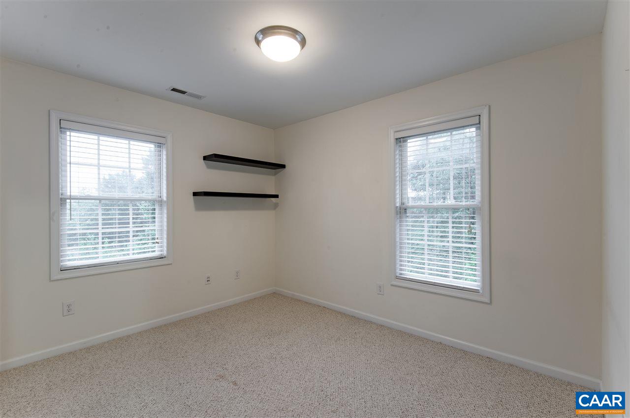 907 Raymond Road Charlottesville, VA 22902 - Photo 25 of 34 an empty room with a window
