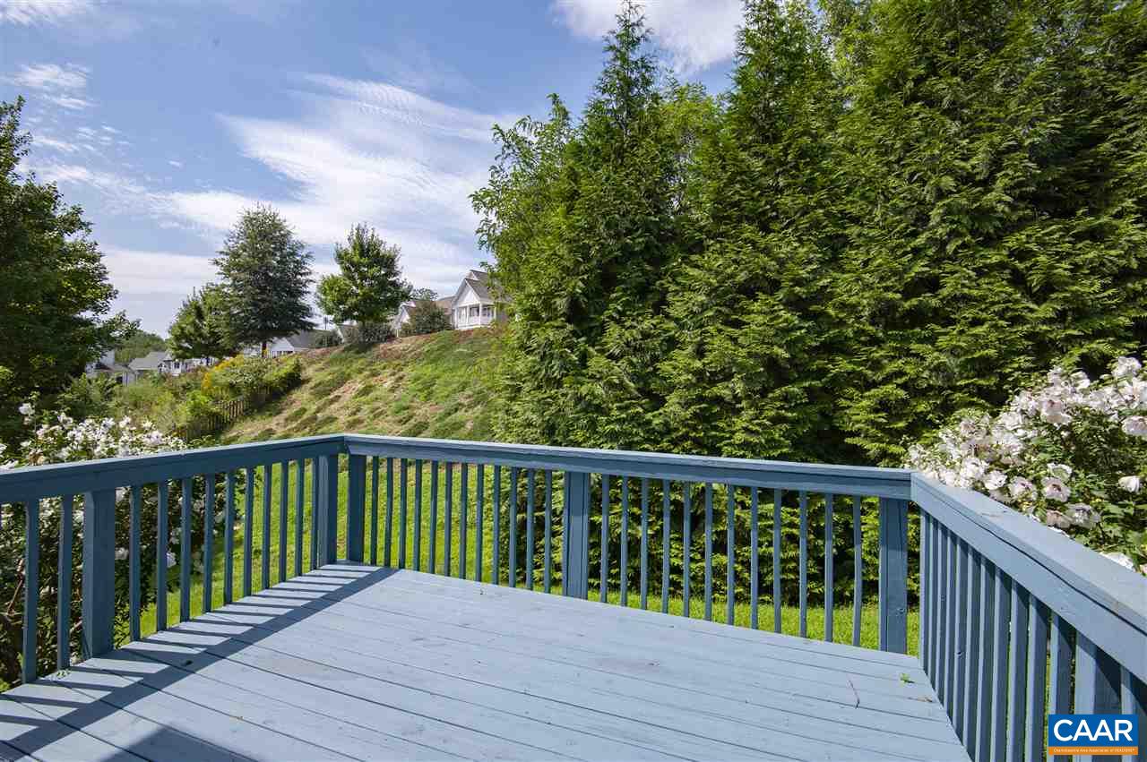 907 Raymond Road Charlottesville, VA 22902 - Photo 33 of 34 a balcony with wooden floor and fence