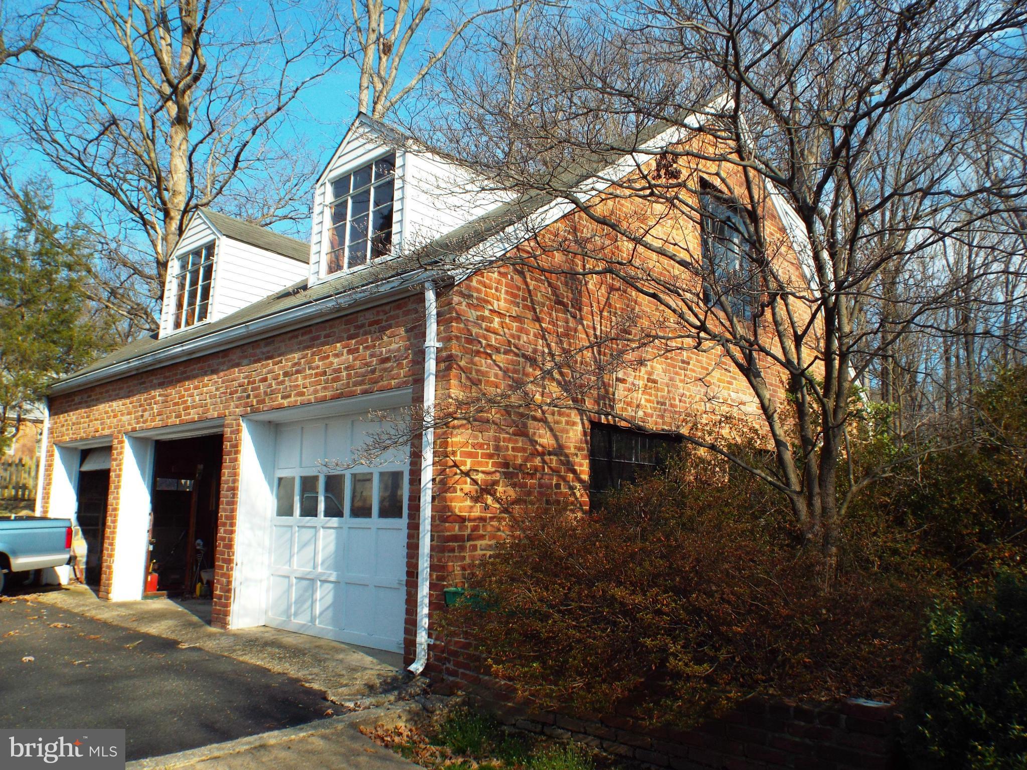 6702 Braddock Road Annandale, VA 22003 - Photo 5 of 10 a front view of a house with yard