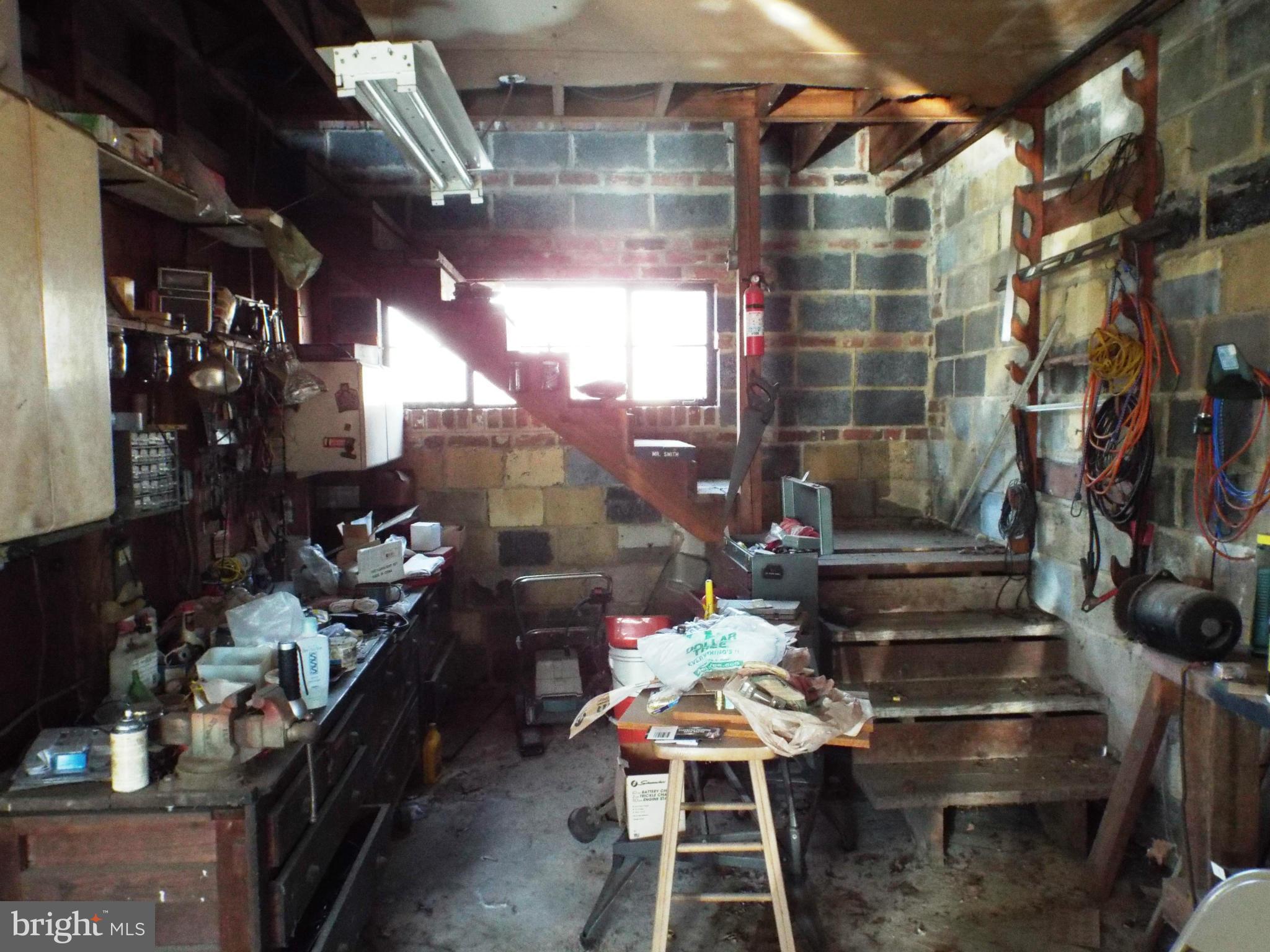 6702 Braddock Road Annandale, VA 22003 - Photo 6 of 10 a store room with chairs