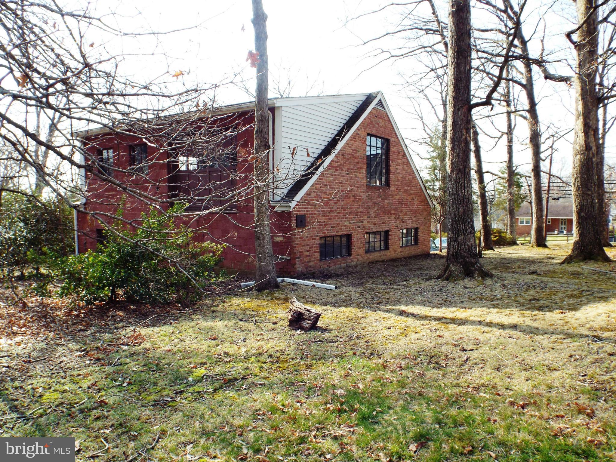 6702 Braddock Road Annandale, VA 22003 - Photo 10 of 10 a view of a house with a yard