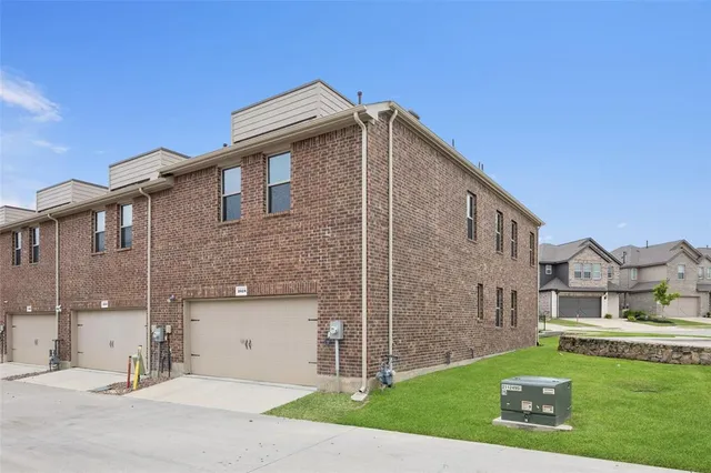 a view of house with yard
