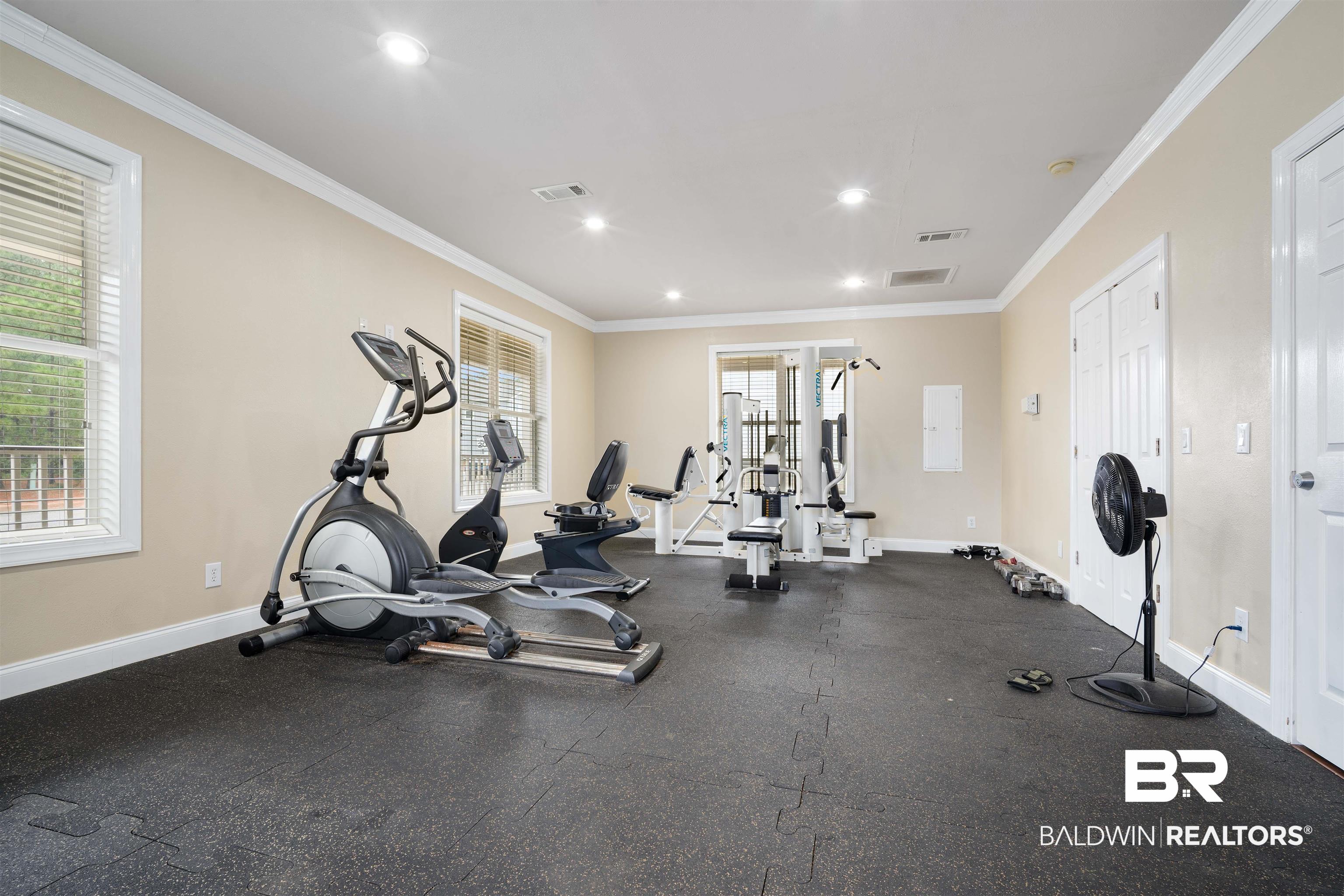 25806 Pollard Road, Unit 205 Daphne, AL 36526 - Photo 24 of 26 Exercise room featuring recessed lighting and ornamental molding