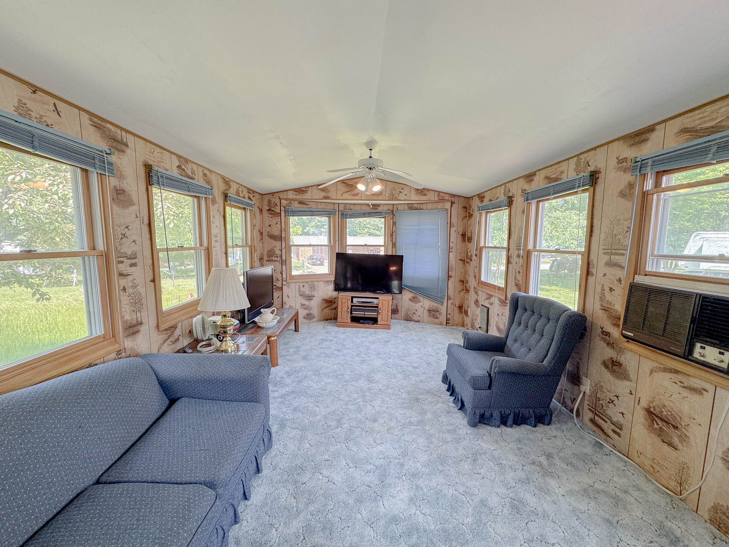 11-221 Woodhaven Sublette, IL 61367 - Photo 11 of 22 a living room with furniture and a fireplace