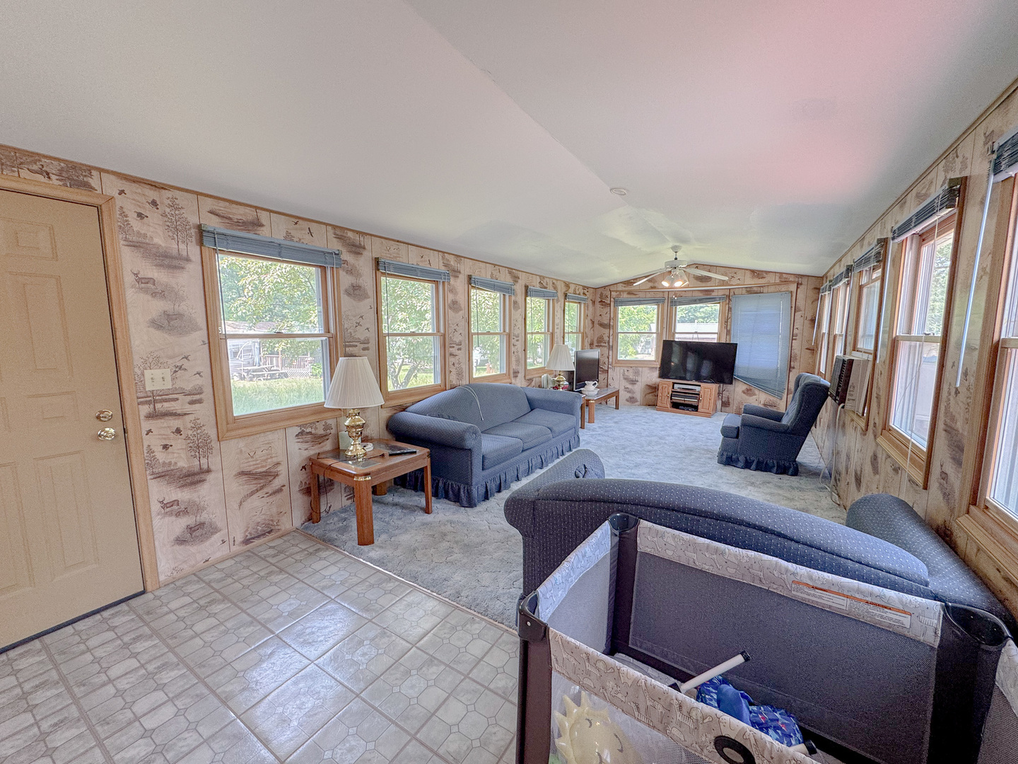11-221 Woodhaven Sublette, IL 61367 - Photo 12 of 22 a living room with furniture and a large window