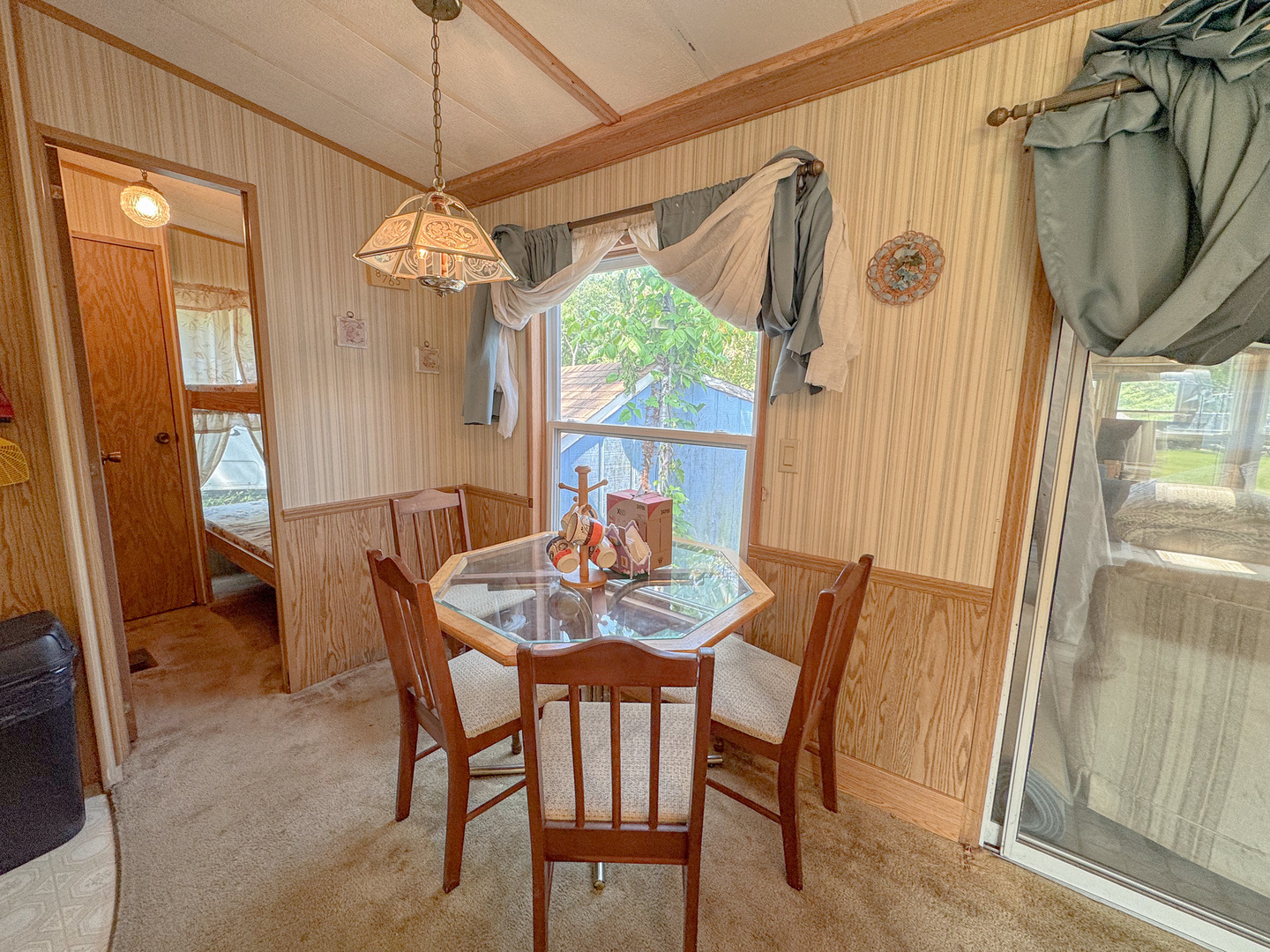 11-221 Woodhaven Sublette, IL 61367 - Photo 20 of 22 a dining room with furniture and window