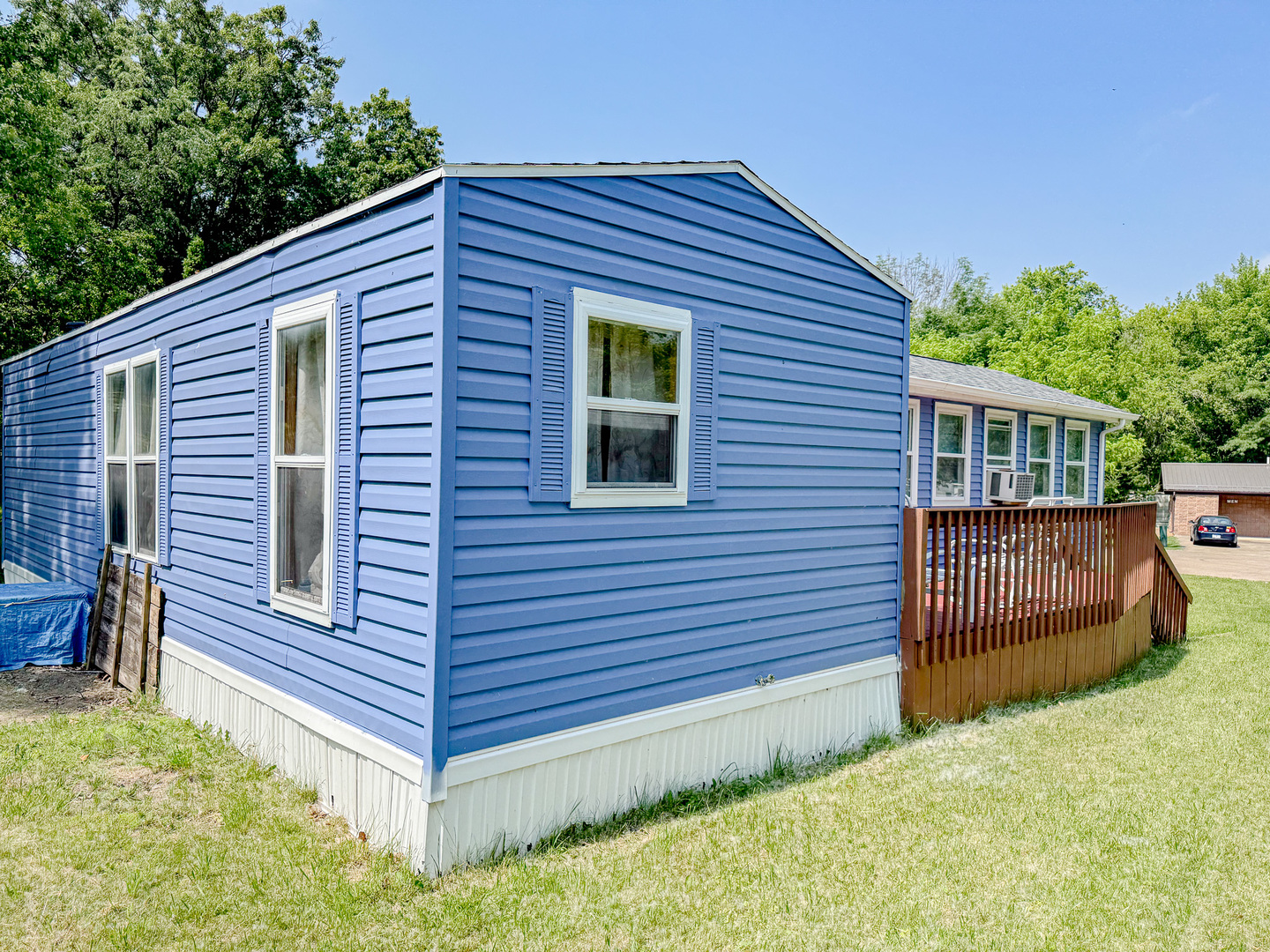 11-221 Woodhaven Sublette, IL 61367 - Photo 7 of 22 a front view of a house with a garden