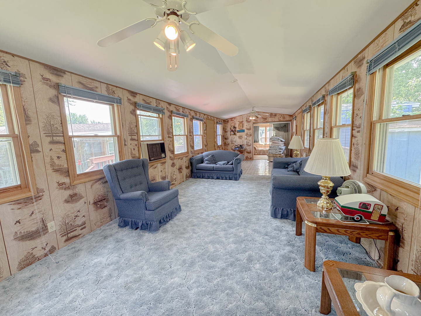 11-221 Woodhaven Sublette, IL 61367 - Photo 10 of 22 a living room with furniture and large windows