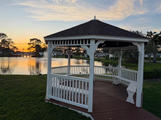 5140 Poppy Place, Unit B Delray Beach, FL 33484 - Photo 11 of 14 a view of a house with backyard and porch