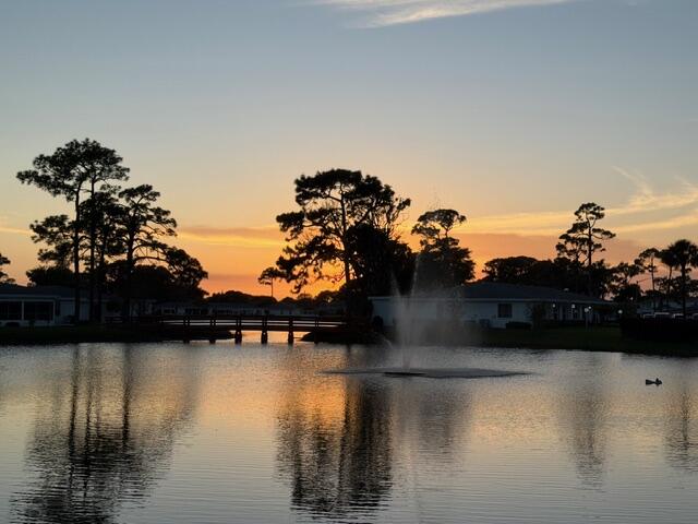 5140 Poppy Place, Unit B Delray Beach, FL 33484 - Photo 12 of 14 a view of balcony with lake view