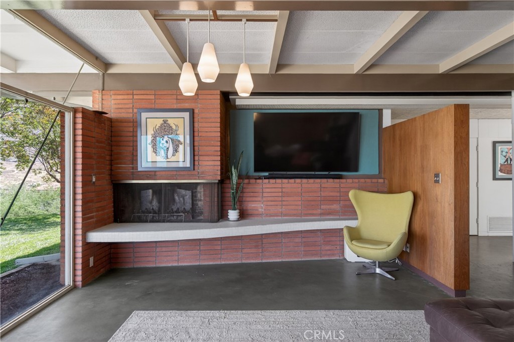 11407 Eton Lane Riverside, CA 92507 - Photo 16 of 47 a living room with furniture and a flat screen tv