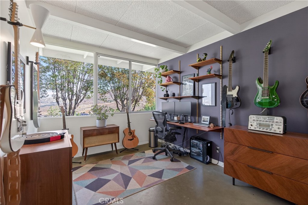 11407 Eton Lane Riverside, CA 92507 - Photo 30 of 47 a living room with furniture and a window