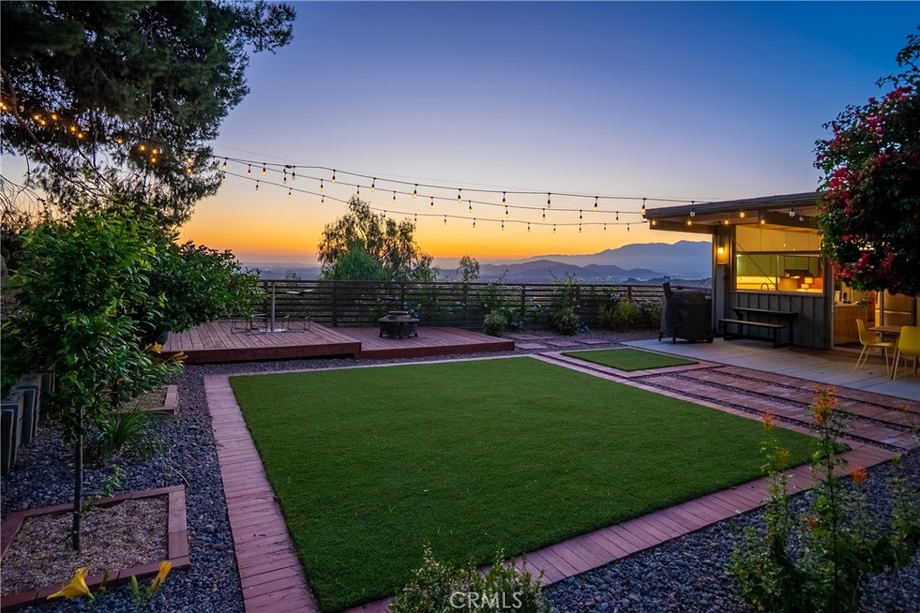 11407 Eton Lane Riverside, CA 92507 - Photo 41 of 47 a view of a big yard with potted plants and large trees
