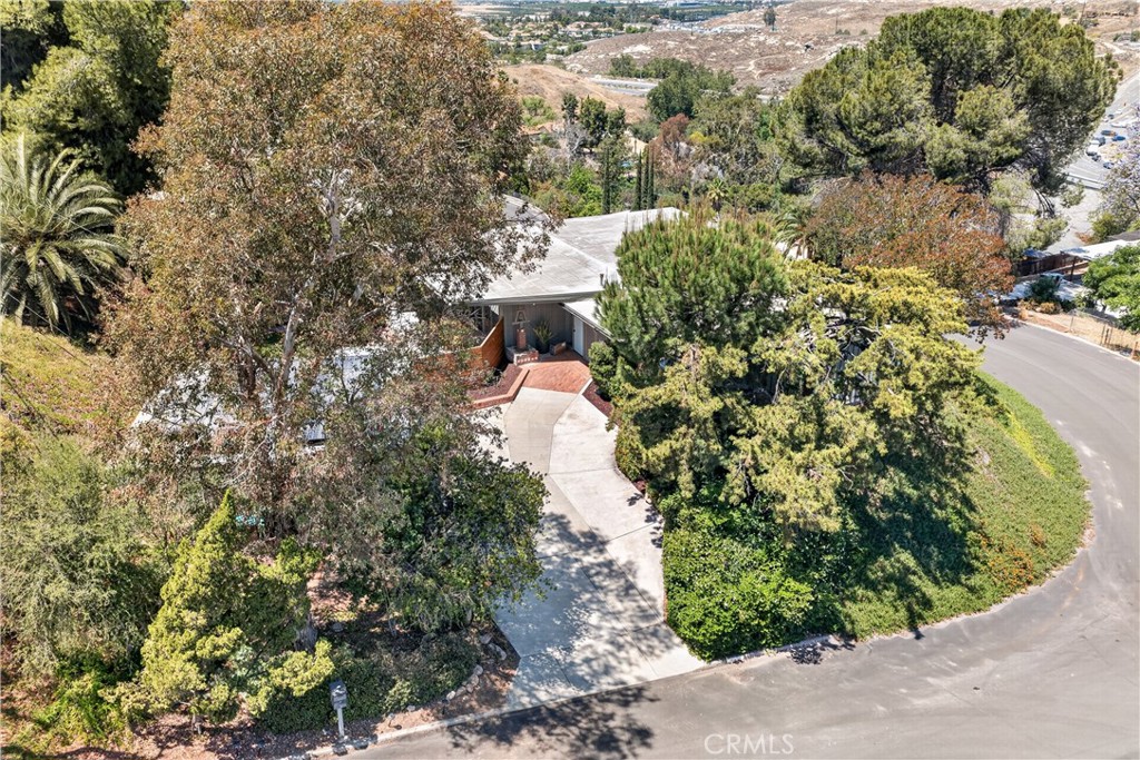 11407 Eton Lane Riverside, CA 92507 - Photo 8 of 47 a aerial view of a house with a yard and garden